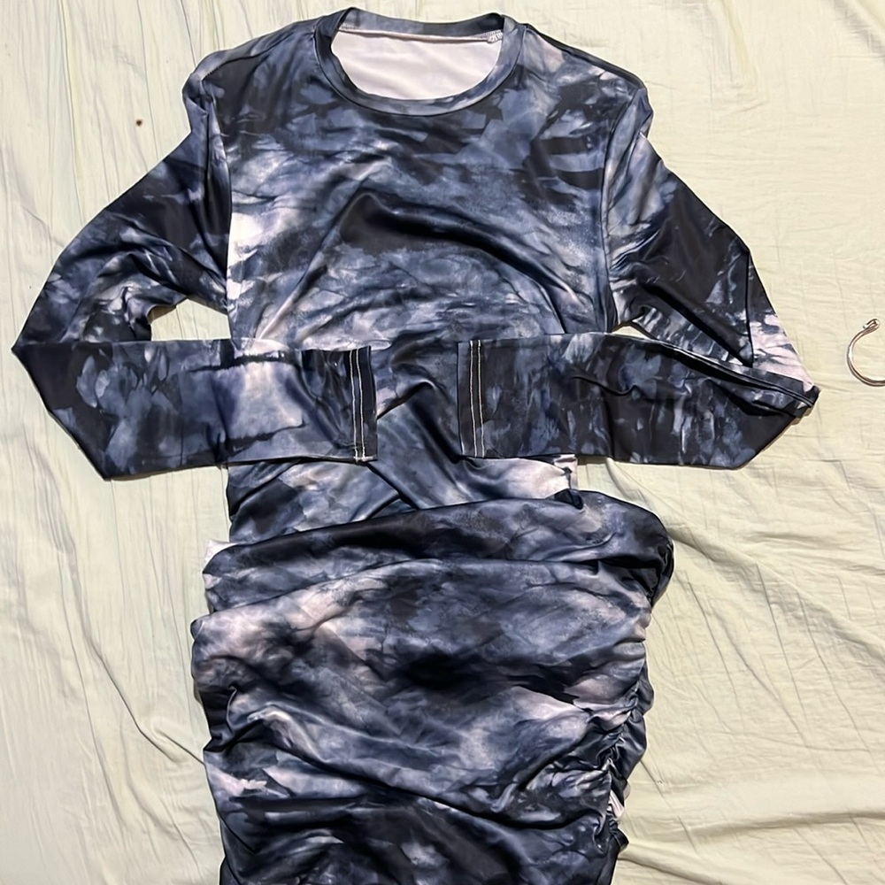 Price is firm ..Beautiful long sleeve dress blue marble color